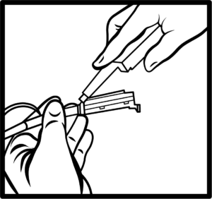 Figure 4 shows Inserting the connector tab into distal end of the handle